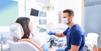 Woman at dental implant consultation in Indianapolis