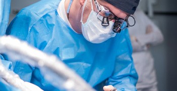 Dentist in Indianapolis performing surgery.