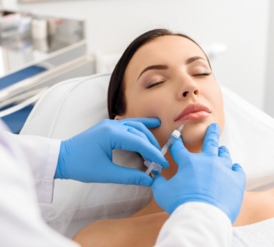 Patient receiving Botox and dermal filler treatment