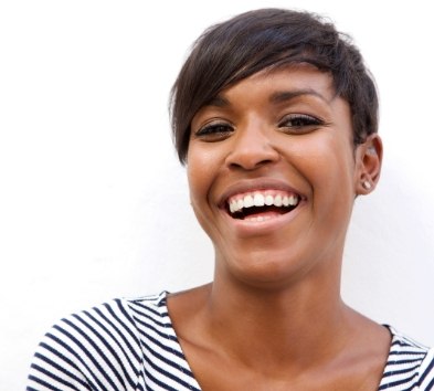 Woman sharing flawless smile after makeover