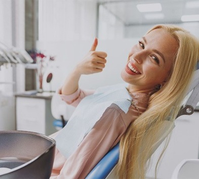 a patient visiting their cosmetic dentist in Indianapolis