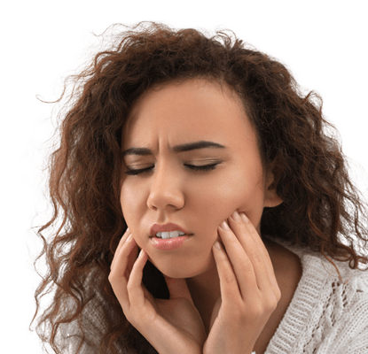 Young woman holding her cheek in pain