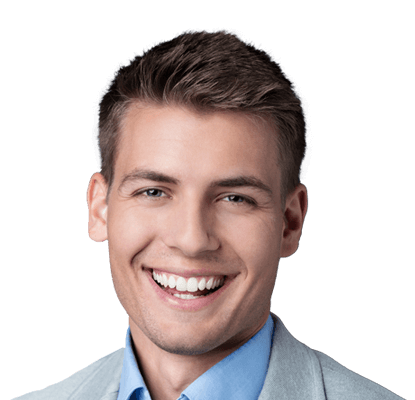 Smiling young man in business attire