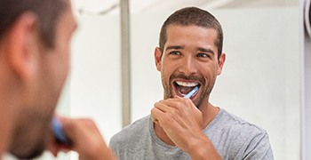 Man brushing his teeth