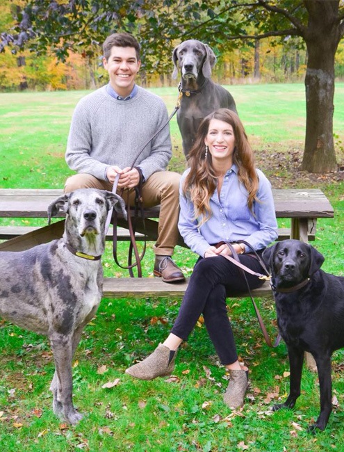 Indianapolis Indiana dentist Corey Martinez D D S with his wife and dogs