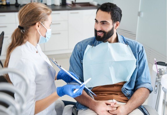patients speaking with team member