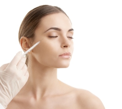 Woman receiving Botox injections for T M J dysfunction