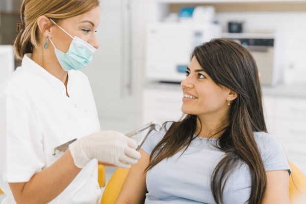 dentist explaining dental implants to patient